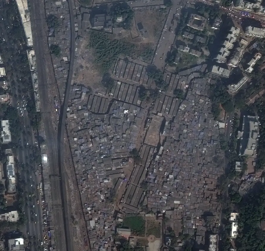 Satellite imagery showing a dense low-rise residential area in Mumbai in 2011